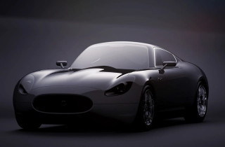 Jaguar E?type Concept 2012 by László Varga, sleek black sports car in low lighting