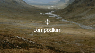 Compodium logo over a vast valley landscape