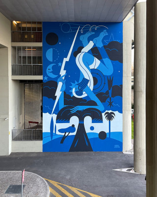 Napoli Mural by Joren Joshua showing abstract figures and celestial motifs