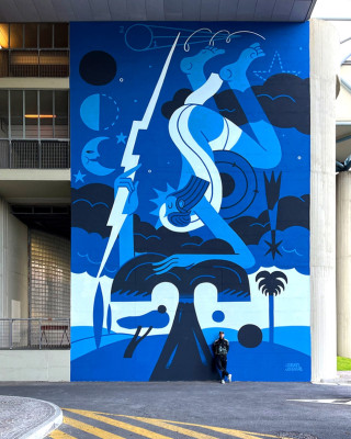 Joren Joshua's Napoli Mural featuring a stylized blue figure holding a lightning bolt