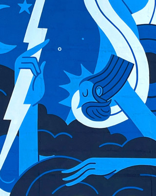 Napoli Mural by Joren Joshua depicting a stylized figure holding a lightning bolt